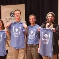 New grads are welcomed into the alumni family with t-shirts